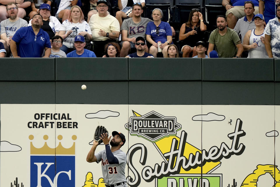 Detroit Tigers center fielder Riley Greene catches a fly ball for the out on Kansas City Royals' Drew Waters during the second inning of a baseball game Monday, July 17, 2023, in Kansas City, Mo. (AP Photo/Charlie Riedel)