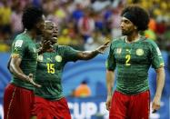 No. 8 - THE HEAD-BUTT. Cameroon's miserable World Cup hit a shocking low when defender Benoit Assou-Ekotto head-butted team mate Benjamin Moukandjo towards the end of their 4-0 capitulation to Croatia. REUTERS/Murad Sezer