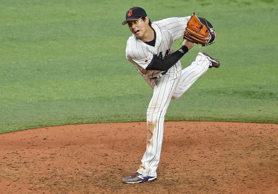 Japan pitcher Shohei Ohtani (16) throws to strike out USA outfielder Mike Trout (27) in the 9th to defeat the United States during the World Baseball Classic Championship Game at loanDepot Park in Miami, Fla. on Tuesday, March 21, 2023.