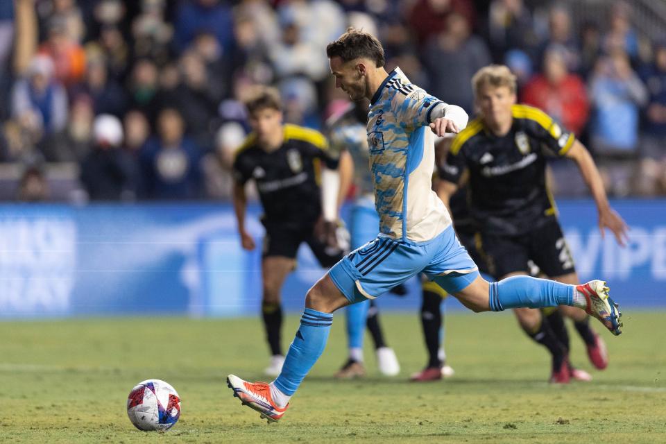 Feb 25, 2023; Philadelphia, Pennsylvania, USA; Philadelphia Union midfielder Daniel Gazdag (10) scores on a penalty kick against Columbus Crew during the first half at Subaru Park. Mandatory Credit: Bill Streicher-USA TODAY Sports