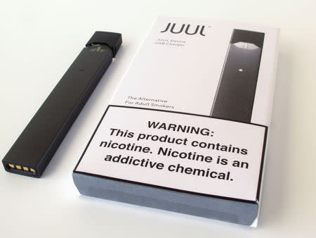 An electronic cigarette device made by JUUL is shown in this picture illustration taken September 14, 2018. REUTERS/Mike Blake/Illustration