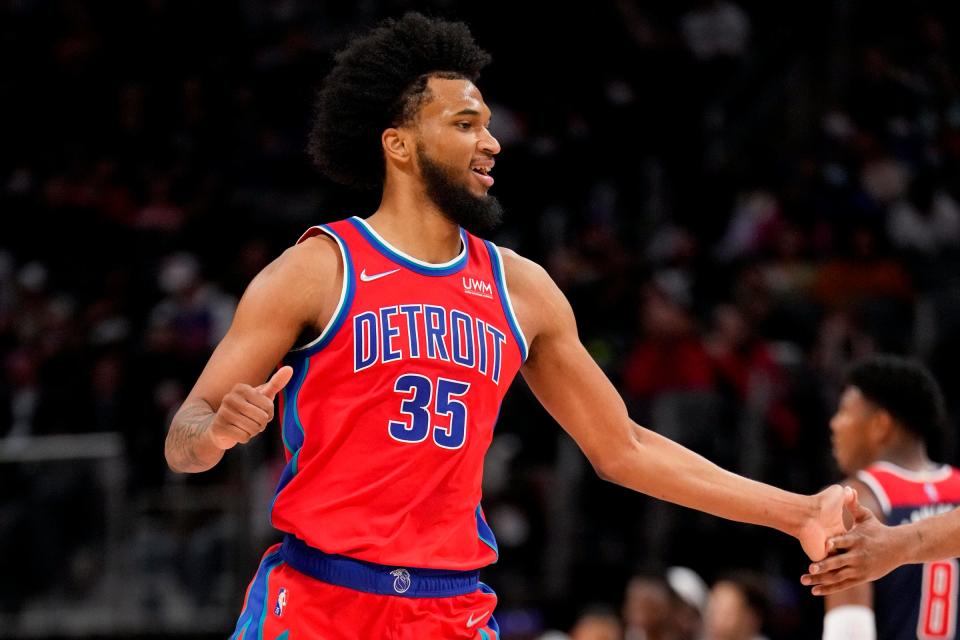 Pistons forward Marvin Bagley III celebrates after a play vs. the Wizards, March 25, 2022, at Little Caesars Arena.