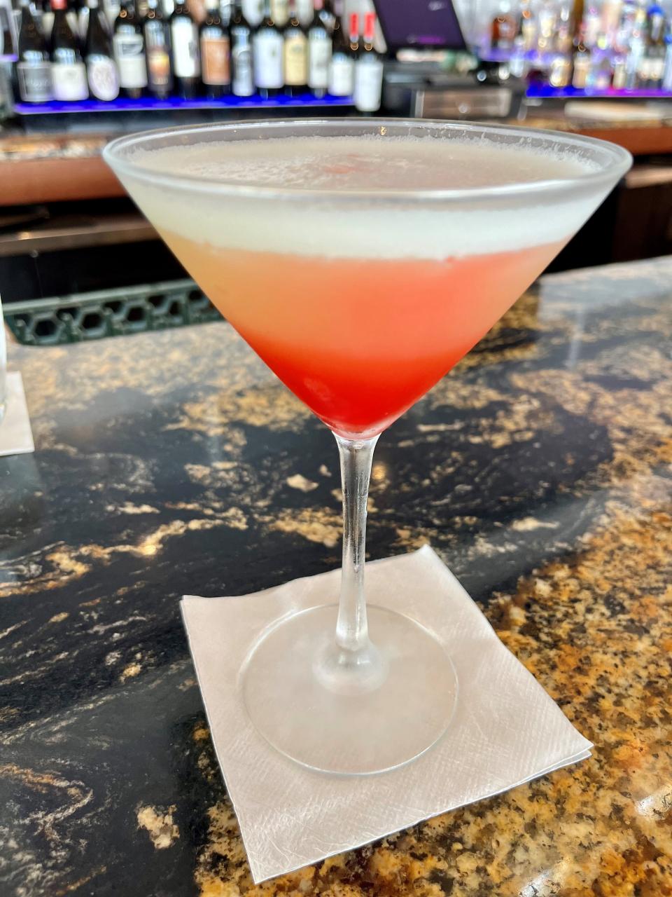 The upside down pineapple martini is one of a dozen signature martinis featured during happy hour at Fresh Catch Bistro on Fort Myers Beach.