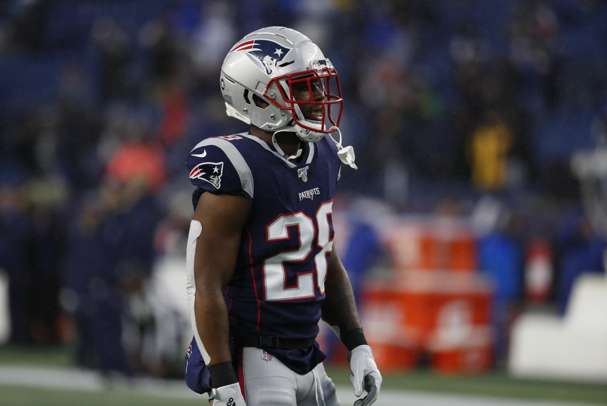 James White on the field before a game last season. 