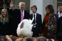 <p>President Donald Trump participates in the 70th National Thanksgiving turkey pardoning ceremony as son Barron and first lady Melania Trump look on in the Rose Garden of the White House in Washington, Nov. 21, 2017. (Photo: Jim Bourg/Reuters) </p>
