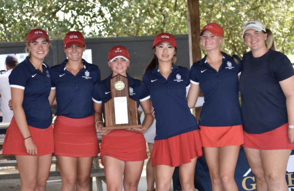 The Sacred Heart Academy golf team won the Region Six championship Wednesday at Nevel Meade. From left are golfers Brooklyn Bohnert, Emma Lindemoen, Grace Vernon, Keira Yun and Charly Garner and head coach Mackenzie Moir.