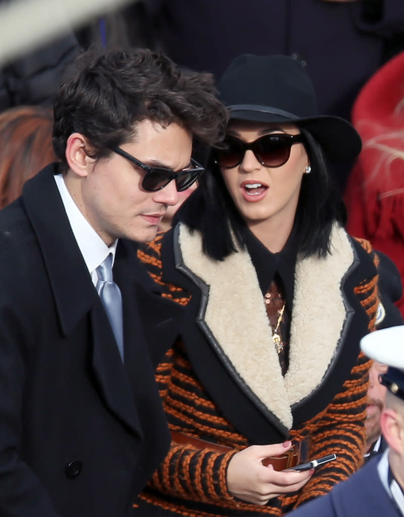 John Mayer and Katy Perry witnessed the president's inauguration -- and in patriotic colors. The singer, who performed on Saturday night for the Kids' Inaugural Ball, kept warm in the 30-degree D.C. temperatures with a blue-and-red striped jacket with white lapel, while her beau looked spiffy in a light blue tie and blue coat. (01/21/2013)