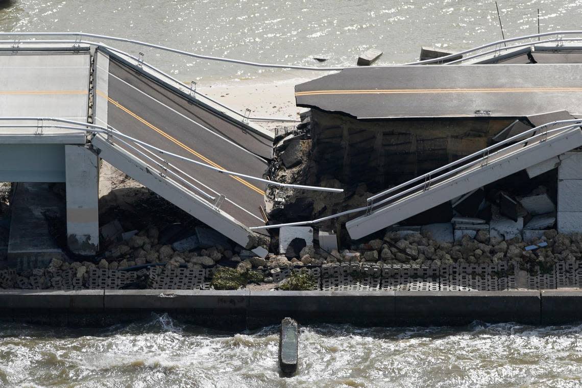 A damaged causeway to Sanibel Island is seen in the aftermath of Hurricane Ian , Thursday, Sept. 29, 2022, near Sanibel Island, Fla. (AP Photo/Wilfredo Lee)