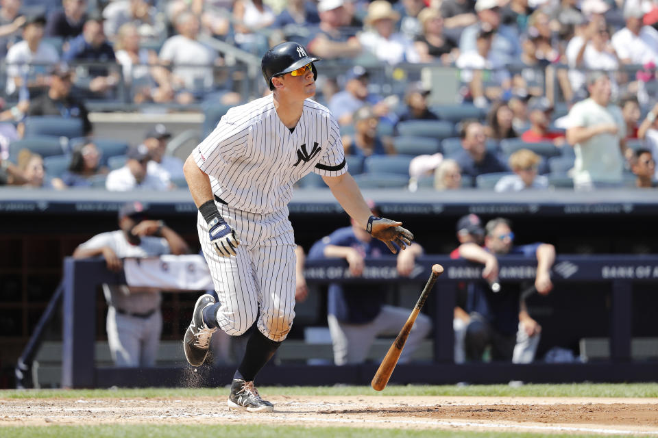 New York Yankees DJ LeMahieu hits a three-run home run against the Boston Red Sox in the fourth inning of a baseball game, Saturday, Aug. 3, 2019, in New York. New York Yankees Breyvic Valera and New York Yankees Brett Gardner scored. (AP Photo/Michael Owens)