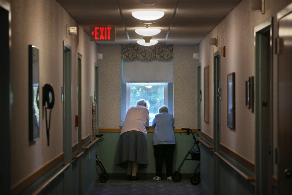 Nursing homes and long-term care facility residents, like these women photographed in Marlborough, Mass., in August, are particularly vulnerable to COVID-19.<span class="copyright">Craig F. Walker—The Boston Globe/Getty Images</span>