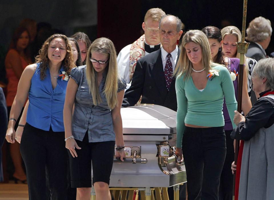 Former teammates of Amanda Buckley's Palm Beach Gardens High School softball team carry Buckley's casket to a hearse following a memorial service at St. Mark's Episcopal Church. Buckley, 18, was murdered on July 20, 2007.