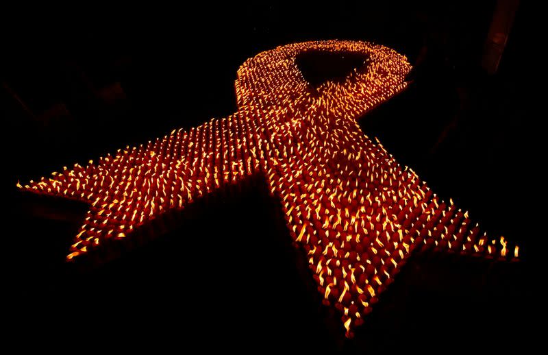 FILE PHOTO: About 2880 candles are seen lit during a World AIDS Day event in Jakarta
