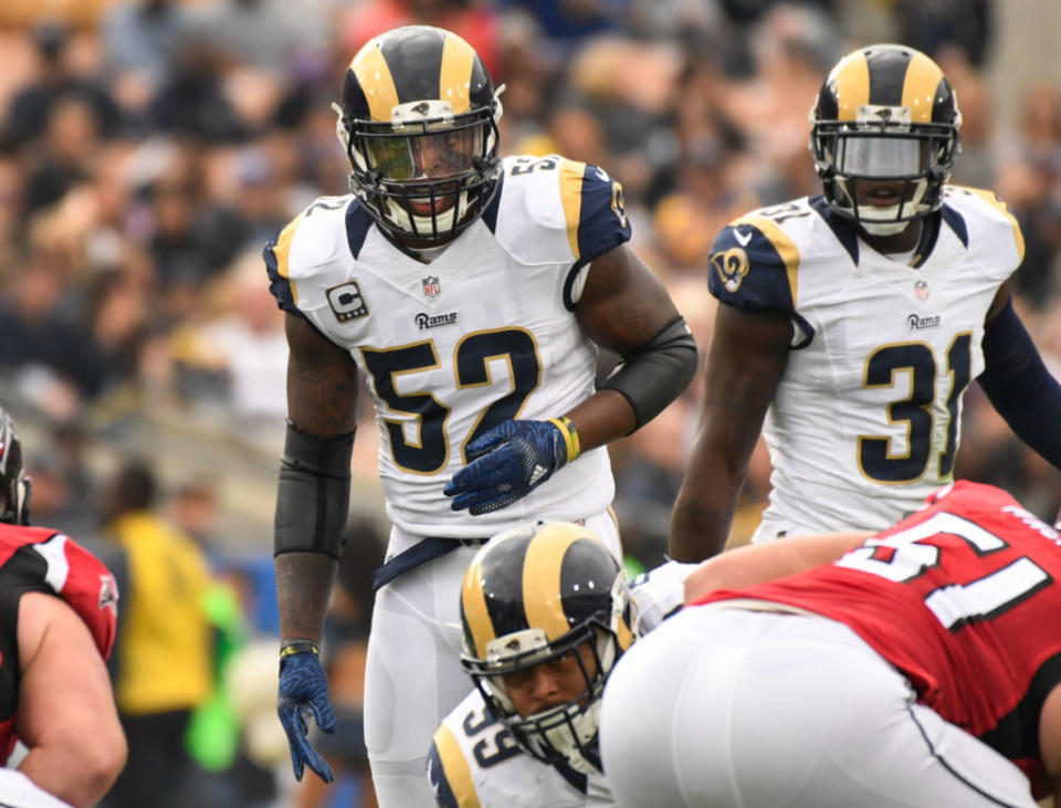 Dec 11, 2016; Los Angeles, CA, USA; Los Angeles Rams middle linebacker Alec Ogletree (52) and Los Angeles Rams free safety Maurice Alexander (31) during the first half against the Atlanta Falcons at the Los Angeles Memorial Coliseum. Mandatory Credit: Robert Hanashiro-USA TODAY Sports