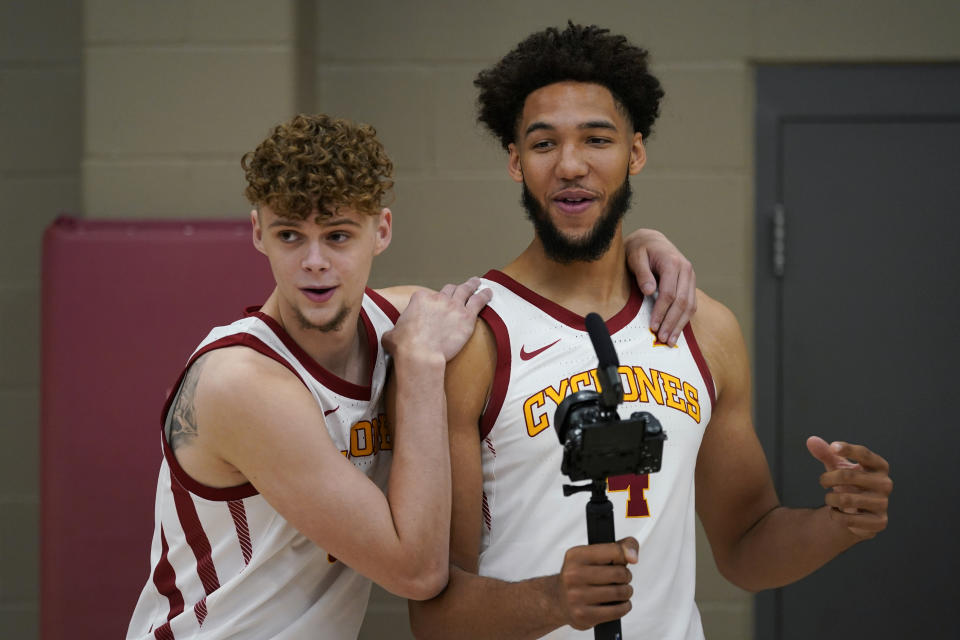 Iowa State forward Aljaz Kunc, left, laughs with teammate forward George Conditt IV during Iowa State's NCAA college basketball media day, Wednesday, Oct. 13, 2021, in Ames, Iowa. (AP Photo/Charlie Neibergall)