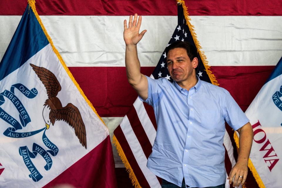 Gov. Ron DeSantis waves to the audience during Operation Top Nunn: Salute to the Troops at Ankeny Regional Airport on Saturday, July 15, 2023 in Ankeny, Iowa.