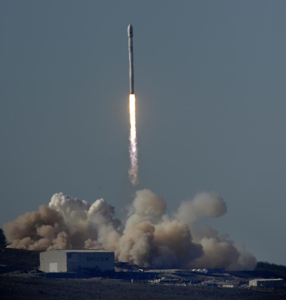 A Falcon 9 rocket carrying a small science satellite for Canada is seen as it is launched from a newly refurbished launch pad in Vandenberg Air Force Station