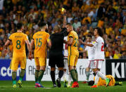 Football Soccer - Australia vs United Arab Emirates - 2018 World Cup Qualifying Asian Zone - Group B - Sydney Football Stadium, Sydney, Australia - 28/3/17 - UAE's Omar Abdulrahman receives a yellow card for his tackle. REUTERS/David Gray