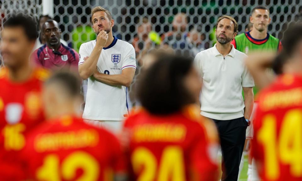 <span>Harry Kane and Gareth Southgate cut dejected figures following England’s defeat by Spain.</span><span>Photograph: Tom Jenkins/The Guardian</span>