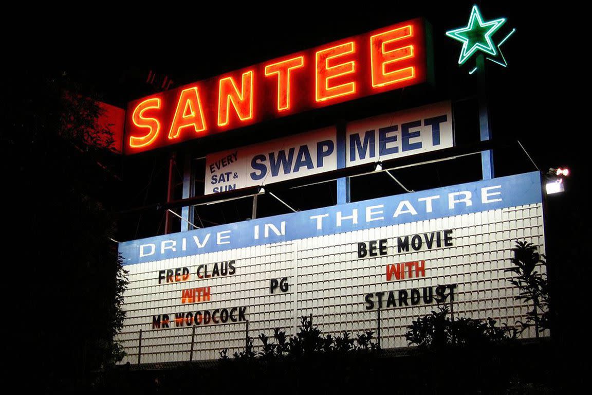 Sign for Santee Drive-In advertising showings for The Village, King Arthur, I Robot, Anchorman.