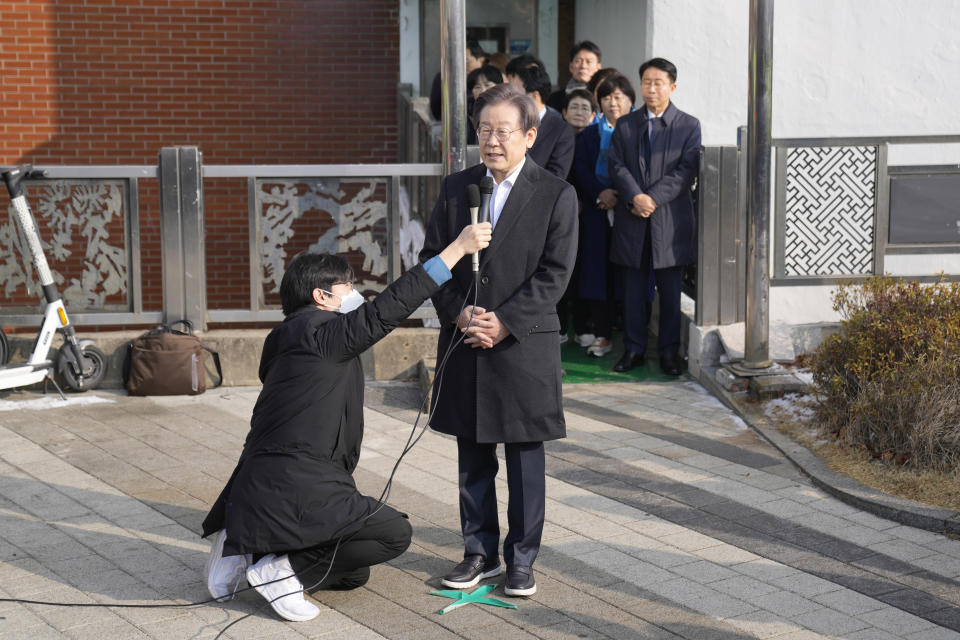 South Korean opposition leader Lee Jae-myung speaks as he leaves a hospital in Seoul, South Korea, Wednesday, Jan. 10, 2024. Lee was stabbed in the neck by a knife-wielding man who approached while asking for his autograph. (AP Photo/Lee Jin-man)