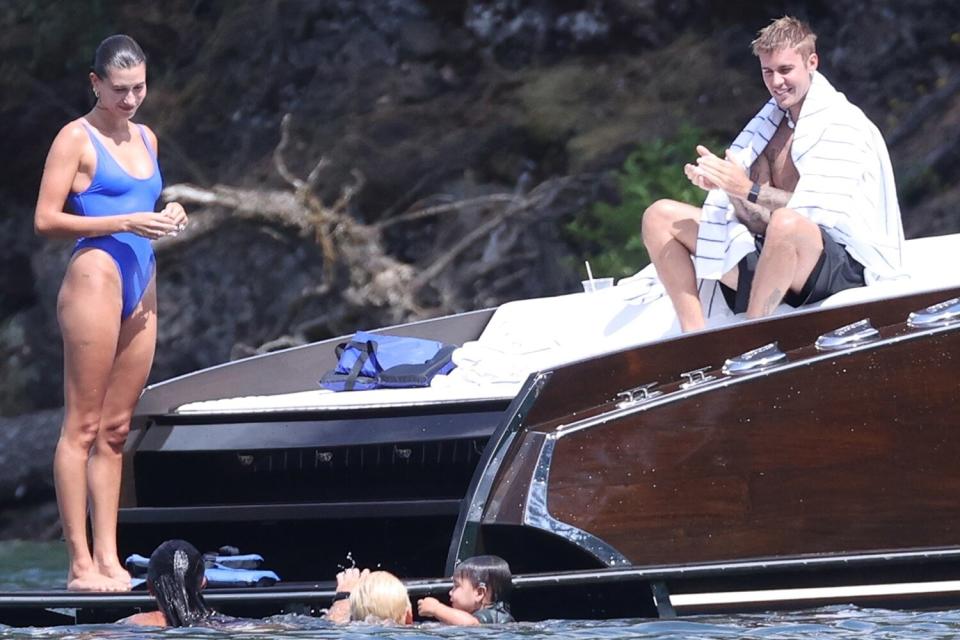 *PREMIUM-EXCLUSIVE* - As long as you love me. Justin and Hailey put on a very sweet loved up display as they lounge on a boat stern during ride on the lake in Couer d’Alene