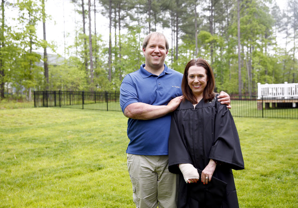 FILE - Lauren Barham Urey is shown with her husband, Matt, at their home in Chesterfield on Friday, May 6, 2022. Lauren, 35, and Matt Urey, 39, returned to New Zealand from their home in Richmond, Virginia, to testify in the Auckland District Court on Wednesday, July 12, 2023, in the trial of three tourism companies and three directors charged with safety breaches over the White Island disaster on Dec. 9. The honeymoon couple were among 47 people on White Island when superheated gases erupted. (Daniel Sangjib Min/Richmond Times-Dispatch via AP, File)