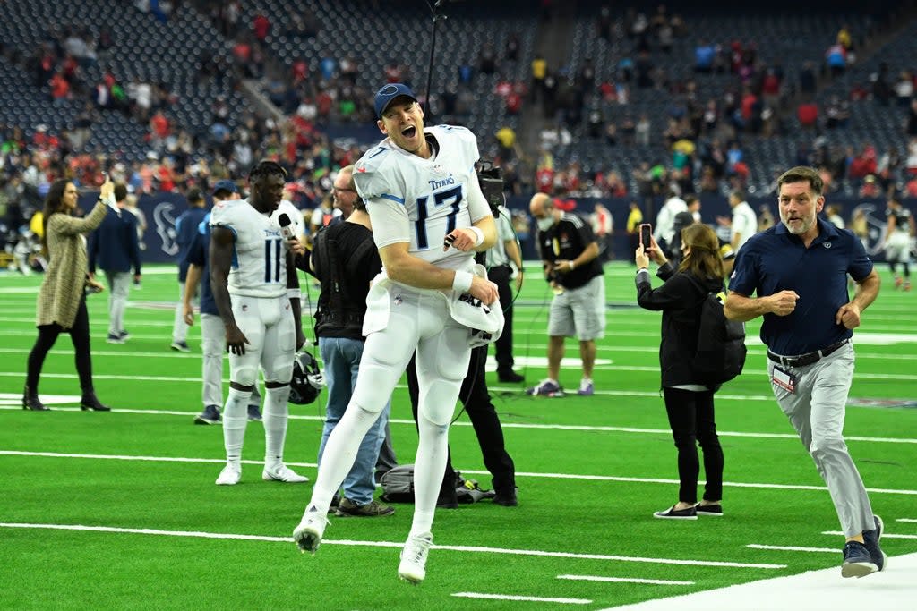 Tennessee Titans quarterback Ryan Tannehill (17) celebrates with fans after their win over the Houston Texans (Justin Rex/AP) (AP)