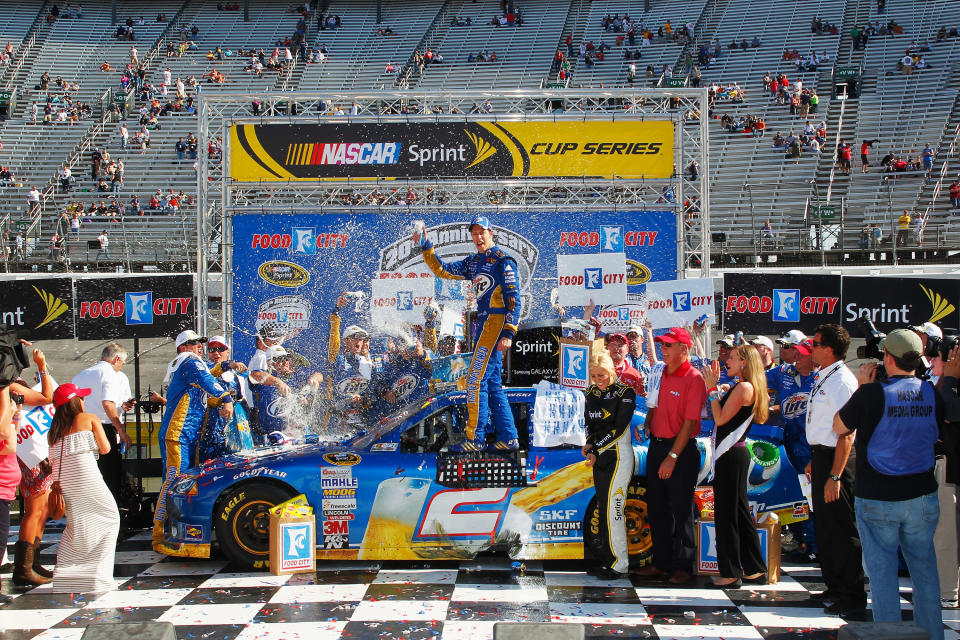 BRISTOL, TN - MARCH 18: Brad Keselowski, driver of the #2 Miller Lite Dodge, celebrates in Victory Lane after winning the NASCAR Sprint Cup Series Food City 500 at Bristol Motor Speedway on March 18, 2012 in Bristol, Tennessee. (Photo by Geoff Burke/Getty Images for NASCAR)