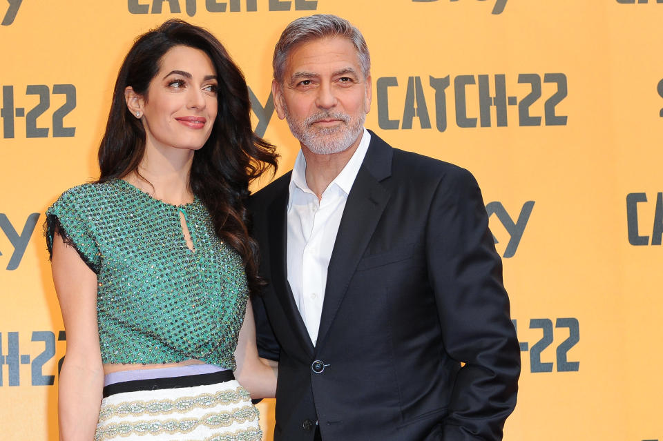 George Clooney, depicted with his wife Amal Clooney, says he steered clear of Hollywood-sounding names for their children. (Photo: Mondadori via Getty Images/Archivio Mondadori via Getty Images/Mondadori via Getty Images)