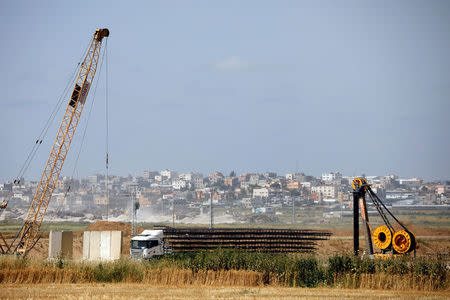 A truck carrying construction materials is seen on the Israeli side of the Israel-Gaza border, Israel April 8, 2018. REUTERS/Amir Cohen