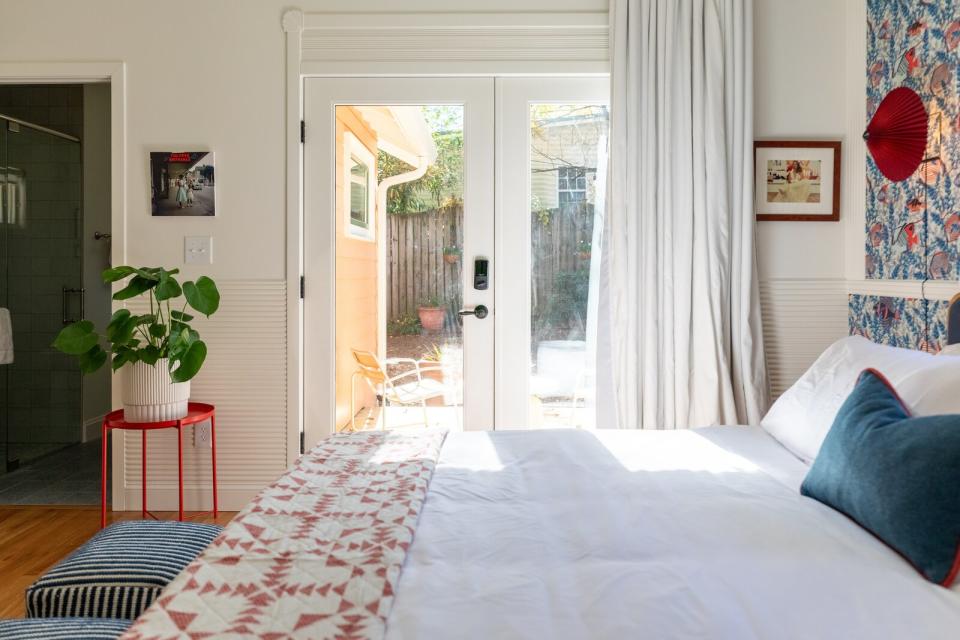 For the primary ensuite bedroom, Hylton-Daniel designed and added a small deck that connects the space to the outdoors.