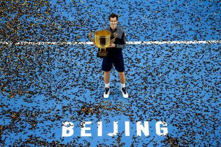 Tennis - China Open men's singles final - Beijing, China - 09/10/16. Britain's Andy Murray holds his trophy after defeating Bulgaria's Grigor Dimitrov. REUTERS/Stringer
