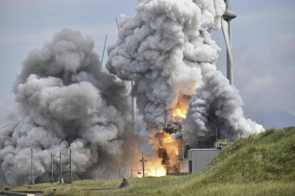 Smoke rises as an engine for an Epsilon S rocket exploded during a test at the Japan Aerospace Exploration Agency's testing site in Noshiro, Akita Prefecture, northeastern Japan, Friday, July 14, 2023. (Kyodo News via AP)