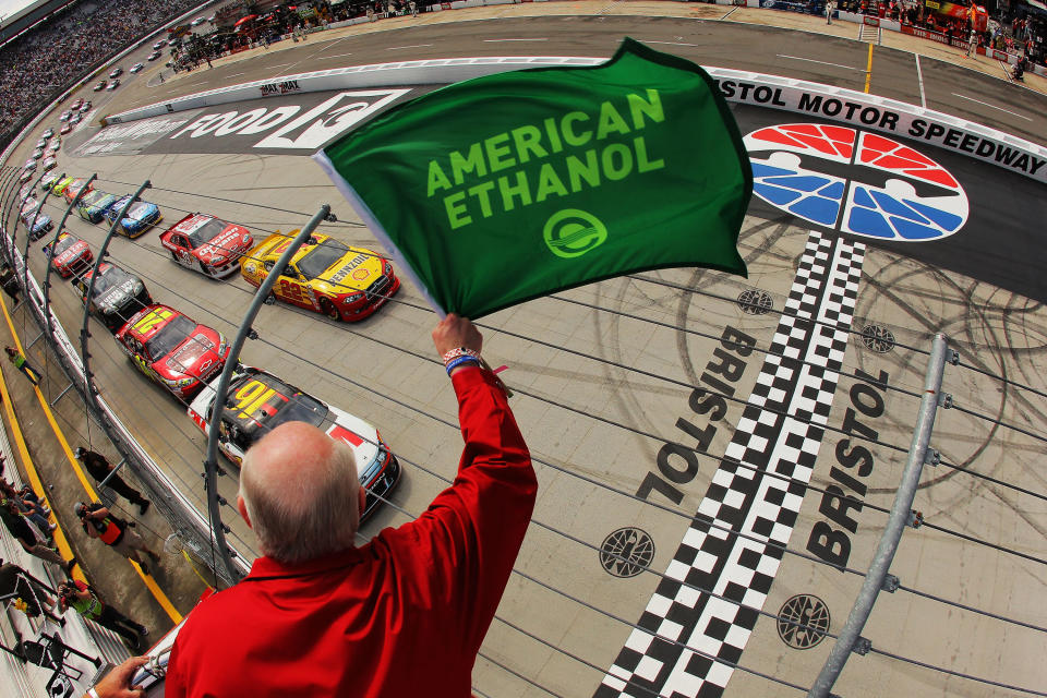 BRISTOL, TN - MARCH 18: Greg Biffle, driver of the #16 3M/811 Ford, and A.J. Allmendinger, driver of the #22 Shell/Pennzoil Dodge, lead the field to the green flag to start the NASCAR Sprint Cup Series Food City 500 at Bristol Motor Speedway on March 18, 2012 in Bristol, Tennessee. (Photo by Justin Edmonds/Getty Images for NASCAR)