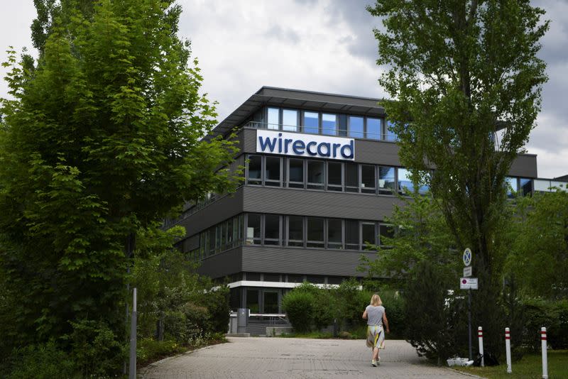 A woman enters the headquarters of Wirecard AG in Aschheim