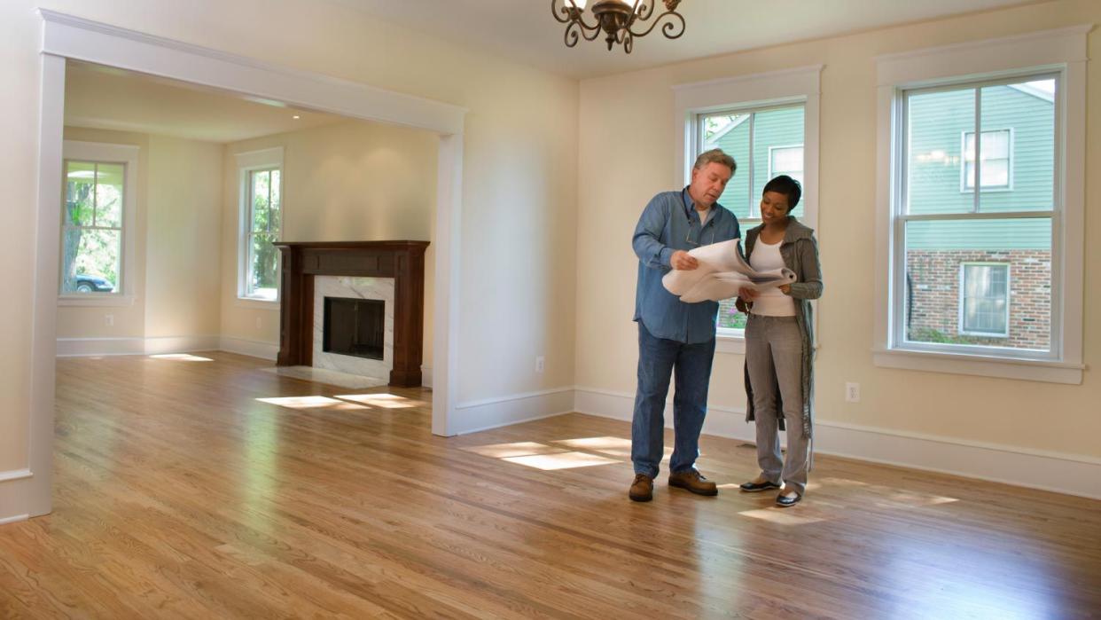 Contractor discussing renovations with a woman