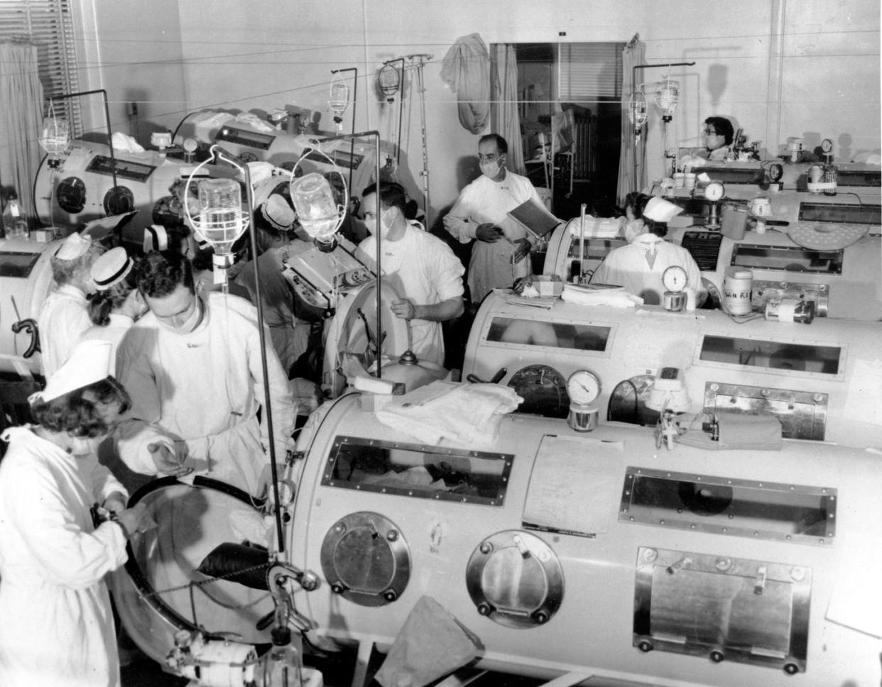 <span class="caption">An emergency polio ward in Boston in 1955 equipped with iron lungs. These pressurized respirators acted as breathing muscles for polio victims, often children, who were paralyzed.</span> <span class="attribution"><a class="link " href="http://www.apimages.com/metadata/Index/Associated-Press-Domestic-News-Massachusetts-Un-/ade0290b02e5da11af9f0014c2589dfb/15/0" rel="nofollow noopener" target="_blank" data-ylk="slk:www.apimages.com;elm:context_link;itc:0;sec:content-canvas">www.apimages.com</a></span>