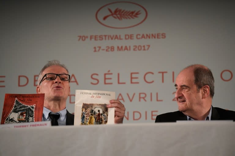 Cannes Film Festival officials Thierry Fremaux (left) and Pierre Lescure announce the movies that will be shown in competition, during a press conference in Paris, on April 13, 2017