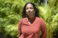 Indian activist Tara Krishnaswamy stands for a photograph in Bengaluru, India, Thursday, March 4, 2021. Krishnaswamy says police would often interrogate peaceful demonstrators, even at small-scale protests like those against potholes in Bengaluru roads. “The intimidation is much more pervasive,” she said. “It comes in many forms, such as trying to silence us when it is peaceful,” she said. “The data for activists arrested doesn’t tell you the full picture - it’s much more pervasive,” she added. (AP Photo/Kashif Masood)