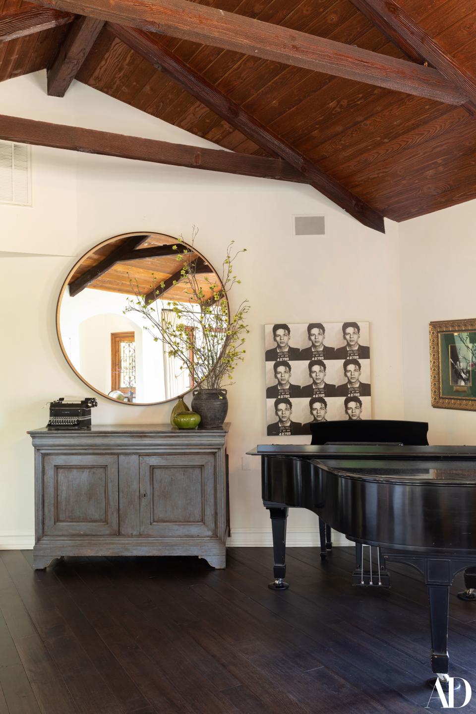One of Stamos’s first purchases when he started his career was this Steinway & Sons piano from the 1940s. On the side table, there’s an old typewriter that was gifted to him from Tom Hanks.