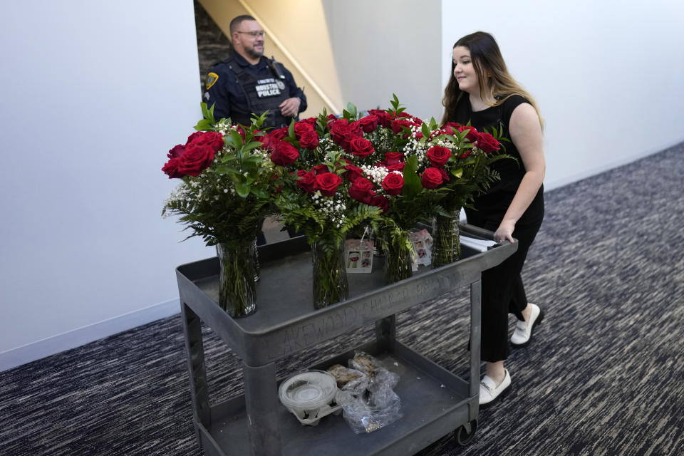 A cart full of red roses is delivered to Lakewood Church, Sunday, Feb. 18, 2024, in Houston. Pastor Joel Osteen welcomed worshippers back to Lakewood Church Sunday for the first time since a woman with an AR-style opened fire in between services at his Texas megachurch last Sunday. (AP Photo/David J. Phillip)