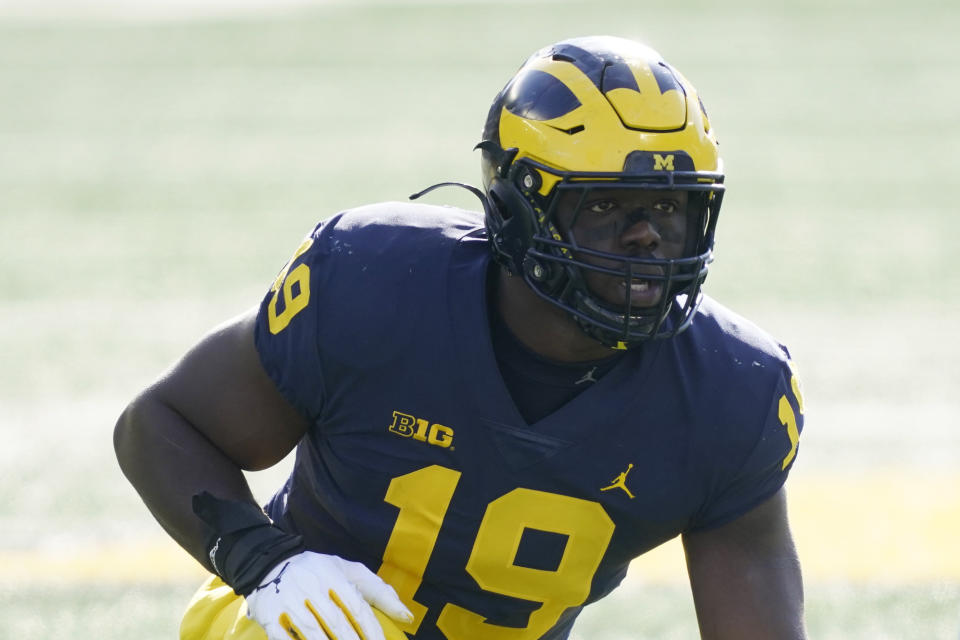 Michigan EDGE Kwity Paye is an athletically blessed, high-motor rusher. (AP Photo/Carlos Osorio)