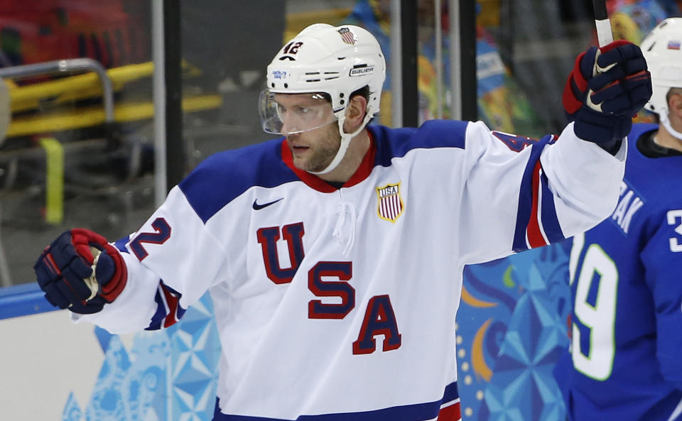 USA forward David Backes celebrates his goal against Slovenia during the 2014 Winter Olympics men's ice hockey game at Shayba Arena Sunday, Feb. 16, 2014, in Sochi, Russia. (AP Photo/Petr David Josek)