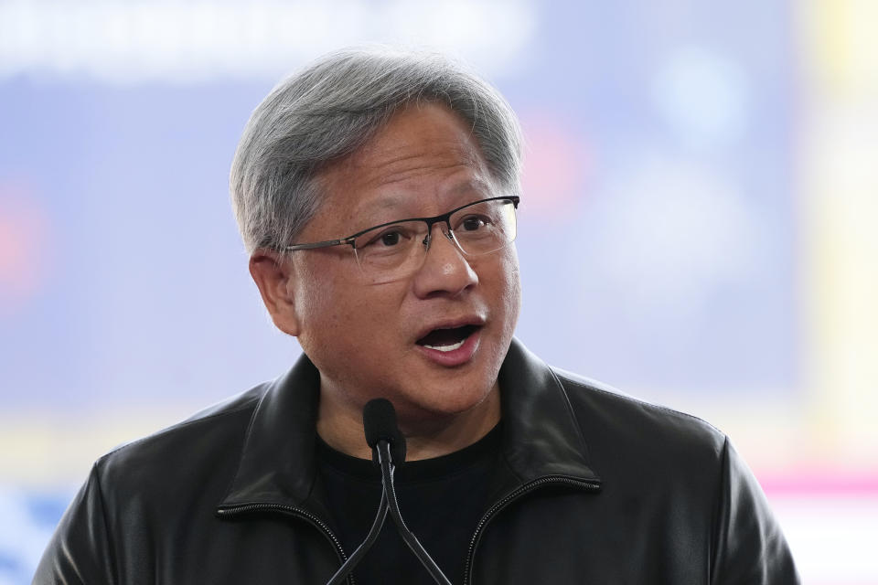 FILE - Nvidia co-founder, president and CEO Jensen Huang speaks at the Taiwan Semiconductor Manufacturing Company facility under construction in Phoenix, Tuesday, Dec. 6, 2022.  NVIDIA stock soared early Thursday as the chipmaker predicted a big increase in sales. In the next quarter, chip demand is noted, especially for his AI-related products and services.  (AP Photo/Ross D. Franklin, File)