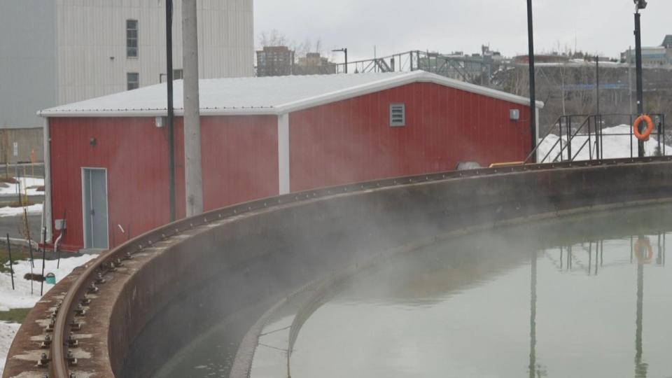 Steam rises from the settling tank at Kruger Products. The heat from this wastewater is what gets transferred to the Zibi buildings.