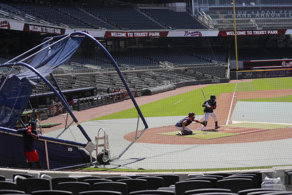 Atlanta Braves' Marcell Ozuna bats during baseball team practice at Truist Park on Friday, July 3, 2020, in Atlanta. (AP Photo/Brynn Anderson)