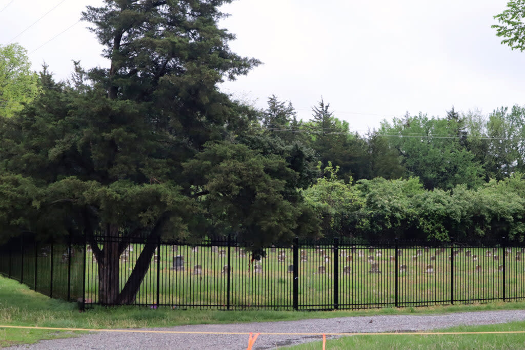 The cemetery at Haskell Indian Nations University in Lawrence holds the remains of 103 children who died during the early years of the institution's history, which began in 1884 as a federal boarding school for Native American children. The cemetery was fenced in 2018 to prevent vandalism.