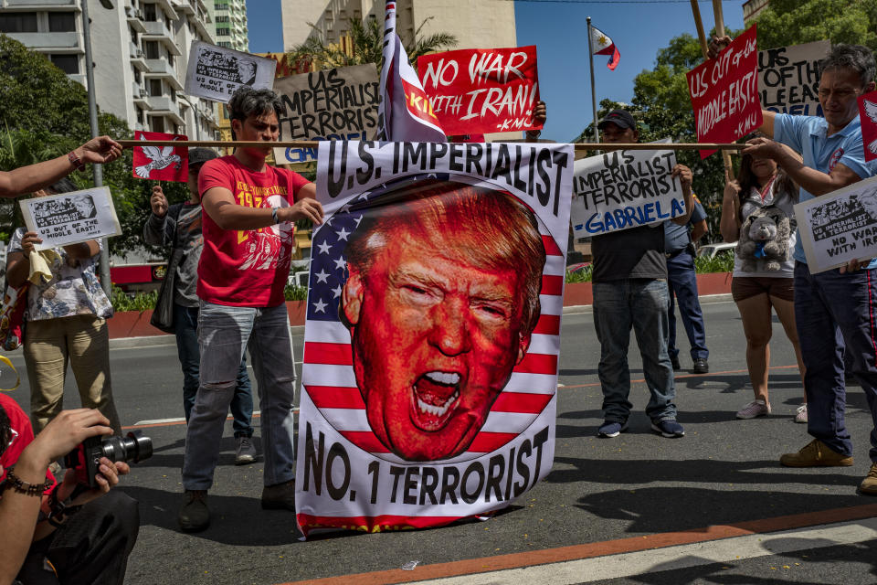 MANILA, PHILIPPINES - JANUARY 06: Filipinos take part in a protest versus US aggression against Iran, at the US embassy on January 6, 2020 in Manila, Philippines. The protest was held in response to increased tensions in the Middle East as a result of a U.S. airstrike that killed Iranian Military Commander Qasem Soleimani last week. (Photo by Ezra Acayan/Getty Images)