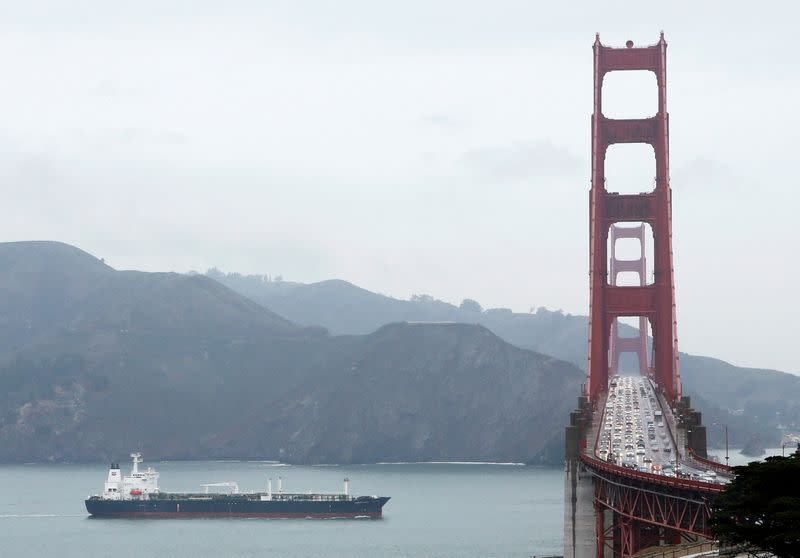 FILE PHOTO: An oil tanker passes underneath the Golden Gate Bridge