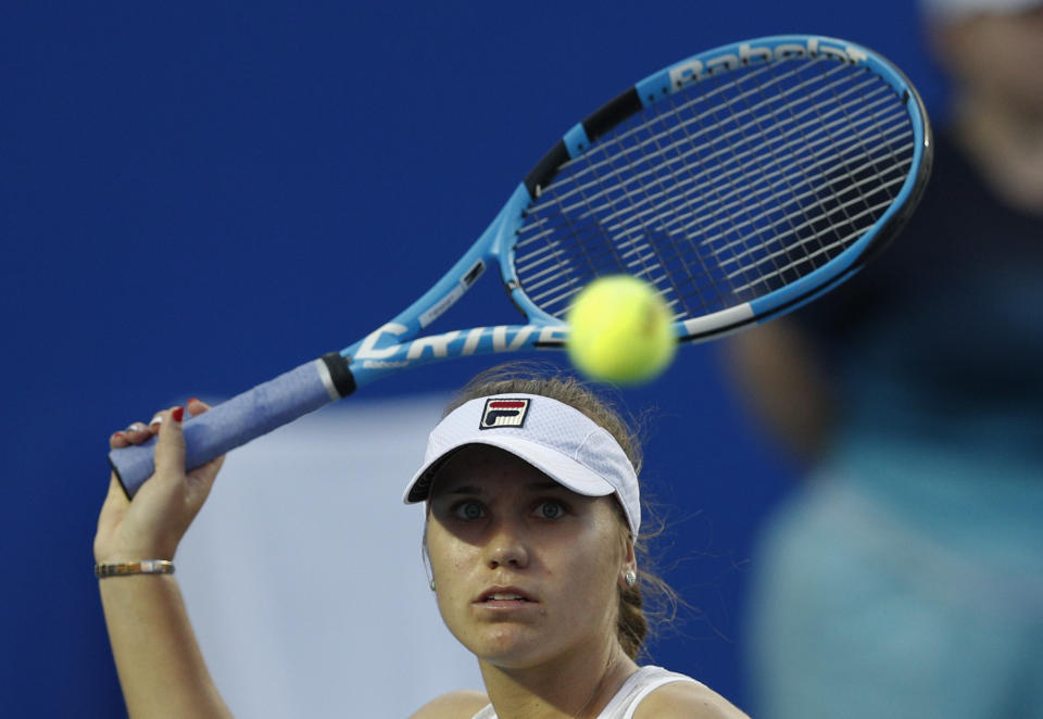 Sofia Kenin of the U.S. returns a ball in her Mexican Tennis Open final match against China's Yafan Wang, in Acapulco, Mexico, Saturday, March 2, 2019. (AP Photo/Rebecca Blackwell)